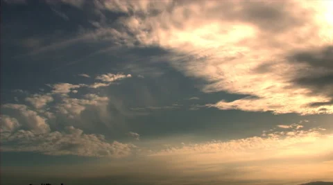 Yellow cirrus stratus clouds on blue sky. Stock Footage 281850894