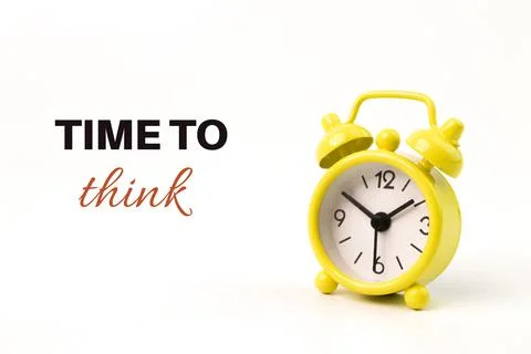 Yellow clock isolated on a white background written with TIME TO THINK. Stock Photos