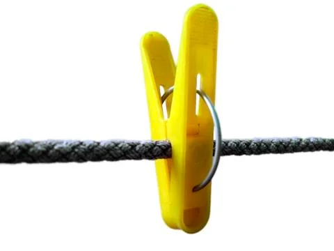 Yellow clothes peg and string on the white background isolated Stock Photos