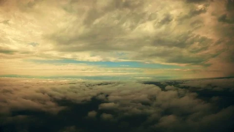 Yellow clouds float by Stock Footage 94669322