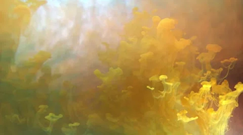 Yellow clouds of ink in water,  abstract background Stock Footage 40434691