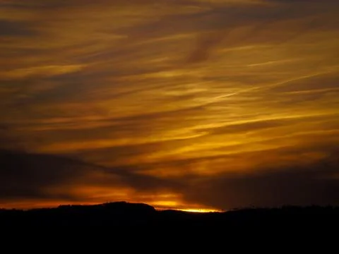 Yellow cloudy  sky sunset Stock Photos