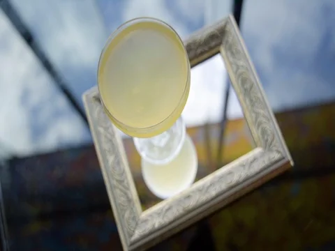 Yellow Cocktail on Mirror Vídeos de archivo 92613730