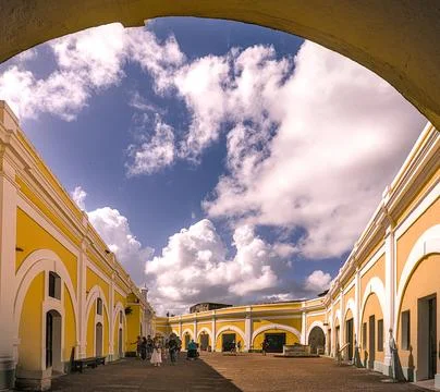 Yellow colonial arched ceiling inside historic building Stock Photos