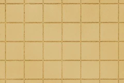 Yellow colored ceramic tile texture, background with square geometric patte.. 写真素材