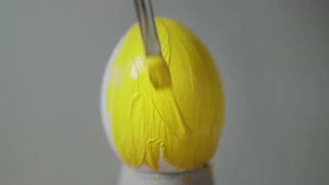 Yellow colored easter egg Stock Footage 146586757