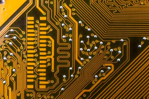 Yellow computer circuit board close-up Stock Photos
