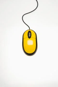 Yellow computer mouse Stock Photos
