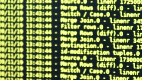Yellow computer software code moving on a black monitor reflect on glass defo Stock Footage 144046552