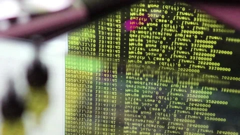 Yellow computer software code moving on a black monitor reflect on glass. Abs 스톡 동영상 144047449