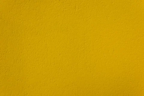 Yellow concrete wall Stock Photos