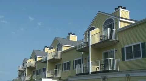 Yellow condominiums (1 of 1) Stock Footage 16679009