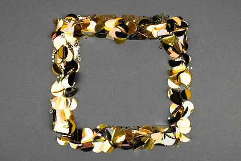 Yellow confetti on a gray background, squared. presentation of fashion colors Foto stock