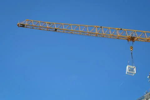 Yellow construction crane Stock Photos