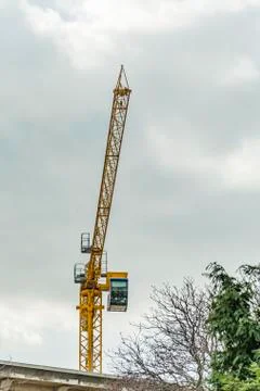 Yellow construction crane Stock Photos