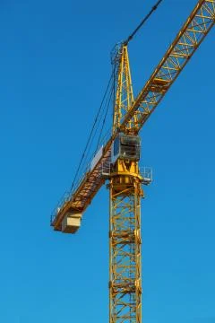 Yellow construction crane Stock Photos