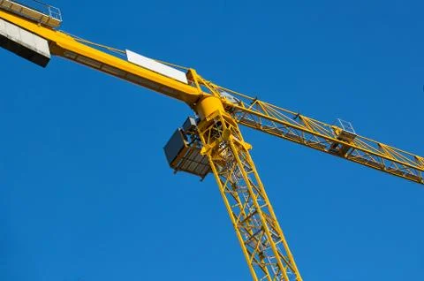 Yellow construction crane Stock Photos
