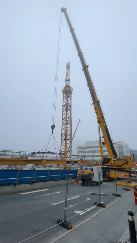 Yellow crane. Construction work. Vertical video. Stock Footage 286251434
