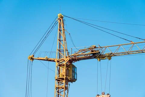 Yellow crane. Technological equipment for construction Stock Photos