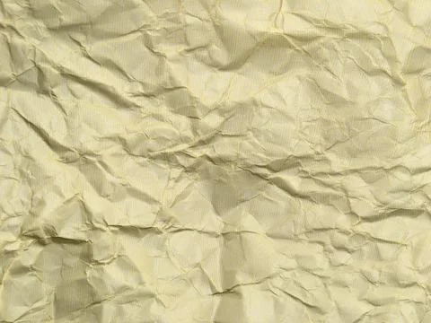 Yellow crumpled paper background with pattern for design Stock Photos