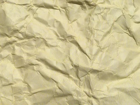 Yellow crumpled paper background with pattern for design Stock-Fotos