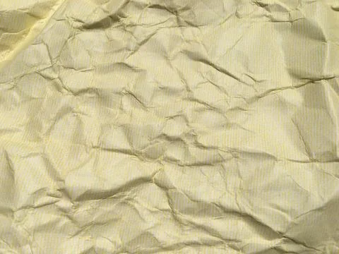 Yellow crumpled paper background with pattern for design Stock-Fotos