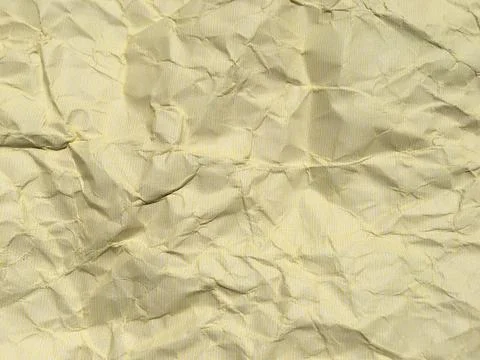 Yellow crumpled paper background with pattern for design Foto stock