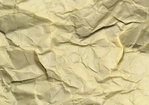 Yellow crumpled paper background with pattern for design Stock-Fotos