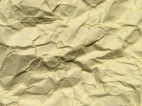 Yellow crumpled paper background with pattern for design Foto stock