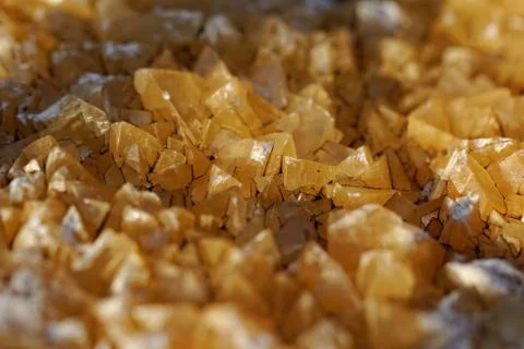 Yellow crystals Stock Photos