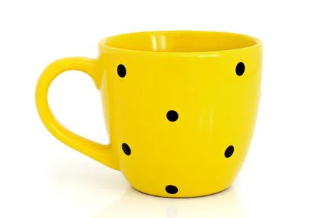Yellow cup Stock Photos