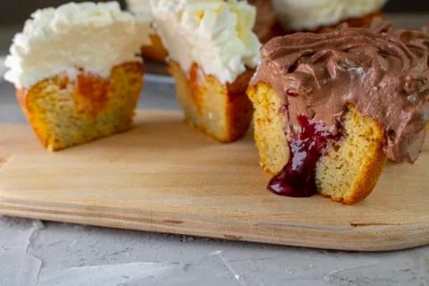 Yellow cupcakes with jam inside. No sugar meal Stock Photos