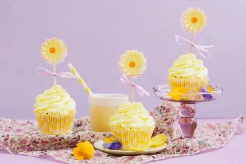 Yellow cupcakes Stock Photos