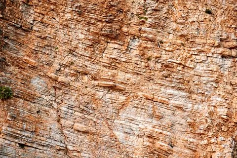 Yellow cut rock texture Stock Photos