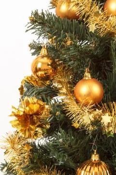 Yellow decorated christmas tree Fotos de archivo