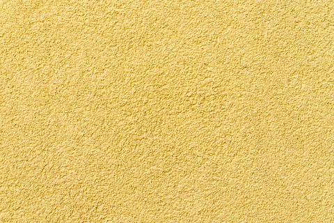 Yellow decorative plaster Stock Photos