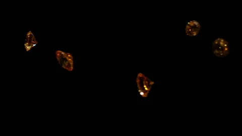 Yellow diamonds falling in slow motion HD3 Stock Footage 253065427