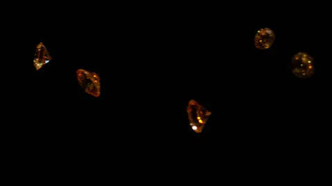 Yellow diamonds falling in slow motion 4K 3 Stock Footage 253158029
