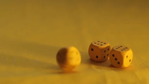 The yellow dice have three sixes Stock Footage 89322353