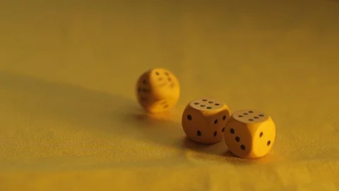 The yellow dice have three sixes Stock Footage 89322390