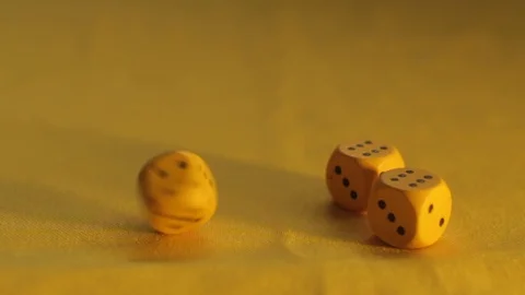 The yellow dice have three sixes Stock Footage 89322414