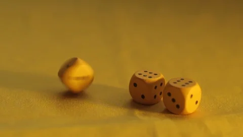 The yellow dice have two sixes and one 1 Stock Footage 89322376