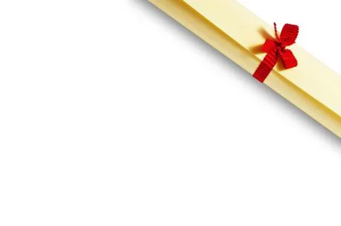 Yellow diploma scroll 스톡 사진