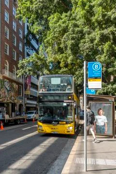 Yellow double decker public bus to Mona Vale picking up passengers Stock Photos