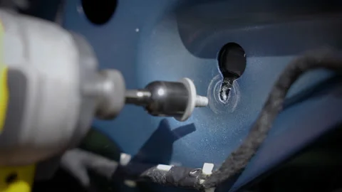 Yellow drill unscrewing a bolt. Video stock 220179960