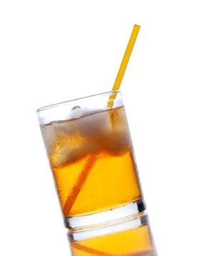 Yellow drink with ice on a white background Stock Photos
