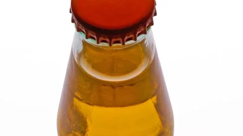 Yellow drink small bottle tracking shot Stockbeeldmateriaal 8924666