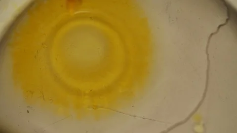 Yellow Drops Causing Small Waves Stock Footage 111757343