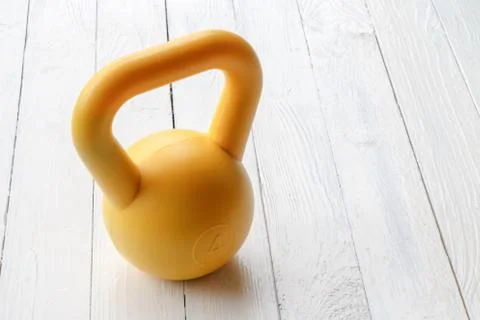 Yellow dumbbell Stock Photos