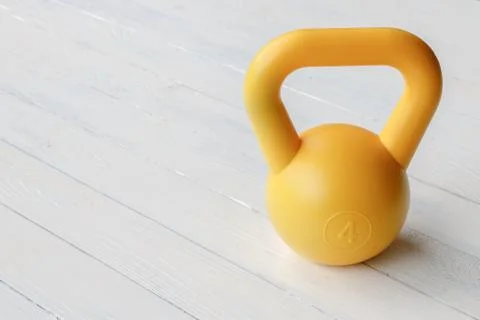 Yellow dumbbell Stock Photos